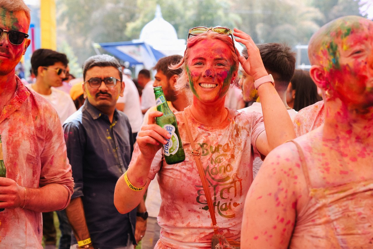A group of young travellers partying at Holi on a TruTravels Holi Festival tour